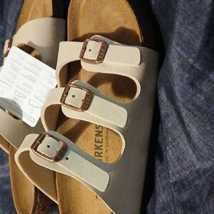 Birkenstock Cream Sandals with Triple Buckles